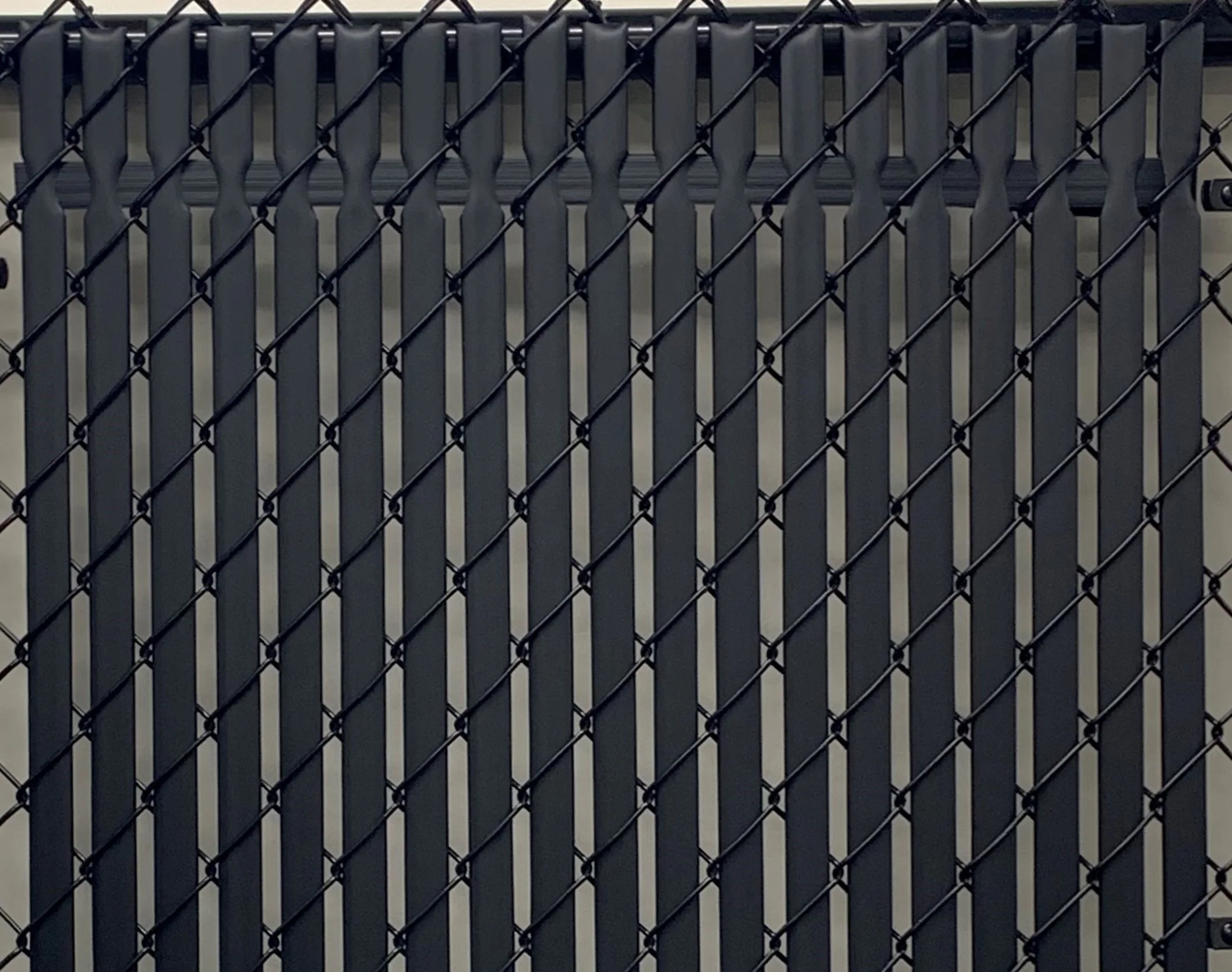 Chain link fence with privacy slats