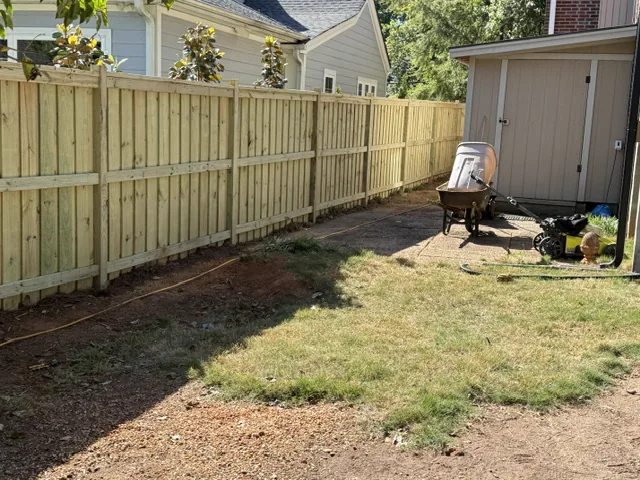 Residential wood fence around a finished backyard in Upstate SC